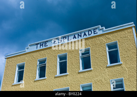 Brightly coloured Esplanade Hotel on the seafront at Kilkee popular beach resort, County Clare, West Coast of Ireland Stock Photo