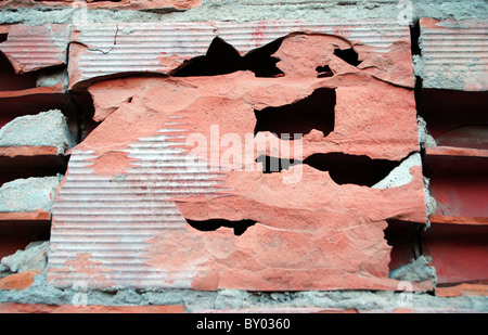 broken wall red brick and cement Stock Photo