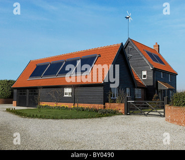Barn fitted with solar panels England UK. Stock Photo