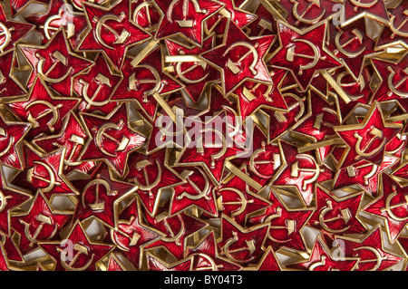 Red star with hammer and sickle cap badges Stock Photo