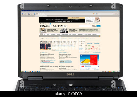 Browsing the Financial Times website on a Laptop Computer, UK Stock Photo