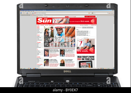 Browsing the The Sun website on a Laptop Computer, UK Stock Photo