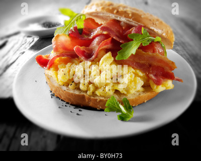 Crispy backon and scrambled eggs on a bagel Stock Photo