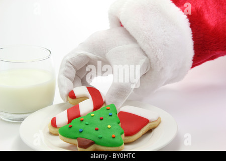 Christmas Cookies, Milk and Santa Claus Stock Photo