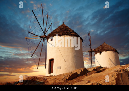 The Windmills overlooking Chora town. Ios Cylcades Islands, Greece. Stock Photo