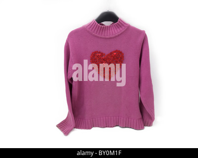 Child's Pink Jumper With Heart Pattern Made Out Of Buttons Stock Photo