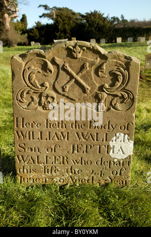 Eighteenth century gravestones skull crossbones Waller family, Ramsholt, Suffolk, England Stock Photo