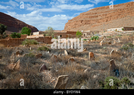 Grave markers in a Berber cemetery in the mountains of southern Morocco, North Africa. Stock Photo