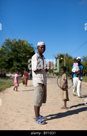 MUECATE, NEAR NAMPULA, MOZAMBIQUE, May 2010: People on the street in Muecate town.    Photo by Mike Goldwater Stock Photo