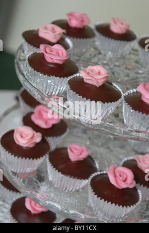 A tower of chocolate Fairy cakes as a wedding cake at reception Stock Photo