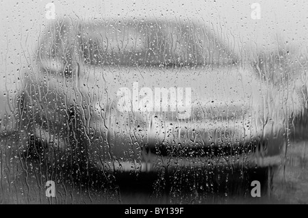 Rain lashing against a kitchen window, Black and White. Stock Photo