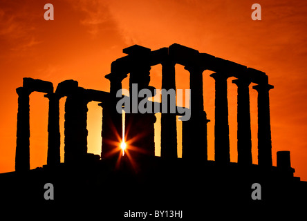 The Temple of Poseidon (ancient God of the sea, according to classical Greek Mythology) at Cape Sounion, around sunset. Stock Photo