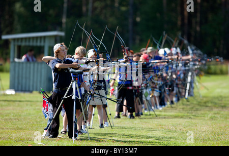 Young archers shooting in an international competition between the Cap of the North countries ( Finland, Sweden, Norway) , Finland Stock Photo