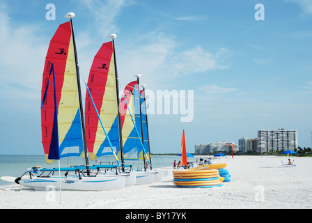 Catamaran sailboats on beach at Marco Island Florida USA in Naples area of Southwest Florida on Gulf of Mexico. Stock Photo