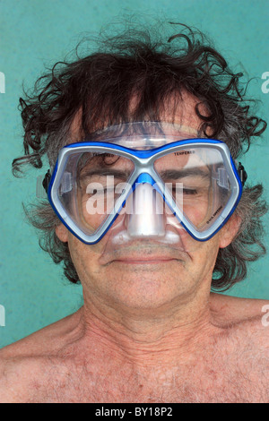 56 YEAR OLD MAN IN SWIMMING POOL BDA Stock Photo
