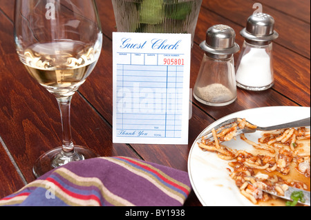 A restaurant dinnertime guest check left blank for placement of copy Stock Photo