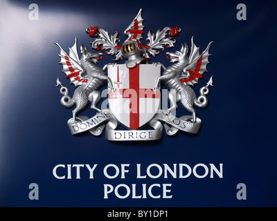 City of London Police emblem on dark blue background shot at Barbican towers domine dirige nos god guides us Stock Photo