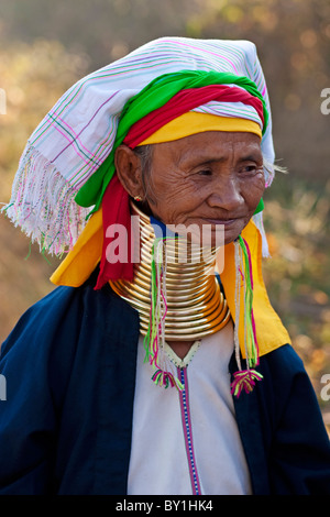 Myanmar, Burma, Loikaw. A Padaung (long-neck) woman wearing her traditional brass neck coils, the weight of which pushes her