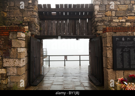 Gateway through the harbour wall by the square tower in Old Portsmouth Stock Photo