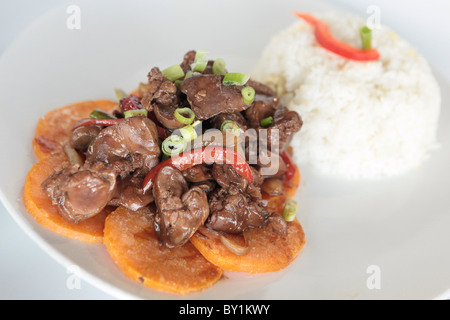 A plate of Chinese style stir fried beef served with rice Stock Photo