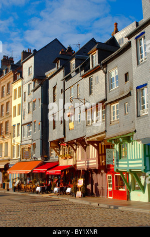 Harbour side restauarants and shops. Honfleur, Normandy, France. Stock Photo