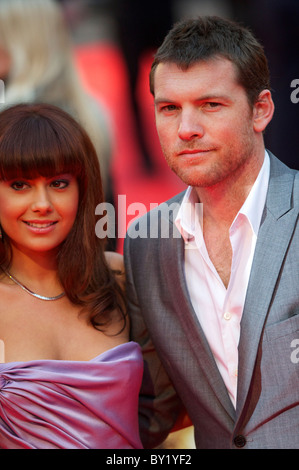 Actor Sam Worthington and girlfriend attend the world premiere of 'The Clash of the Titans,' a remake of the 1981 film, at Stock Photo