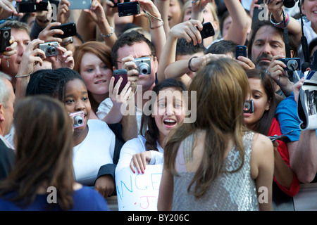 Fans clamor for autographs from Angelina Jolie at the premiere of 'Salt,' on August 16, 2010, at the Empire, Leicester Square Stock Photo