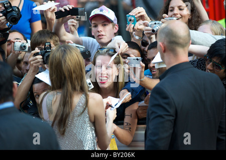 Fans clamor for autographs from Angelina Jolie at the premiere of 'Salt,' on August 16, 2010, at the Empire, Leicester Square Stock Photo