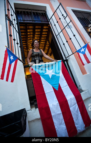A balcony decorated in Puerto Rican flags during the Festival of San Sebastian in San Juan, Puerto Rico. Stock Photo