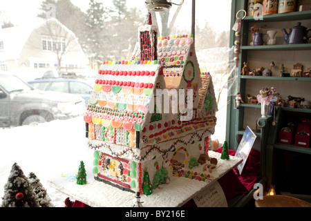 A gingerbread house sits in the window of a Stockbridge, Massachusetts gift shop. Stock Photo