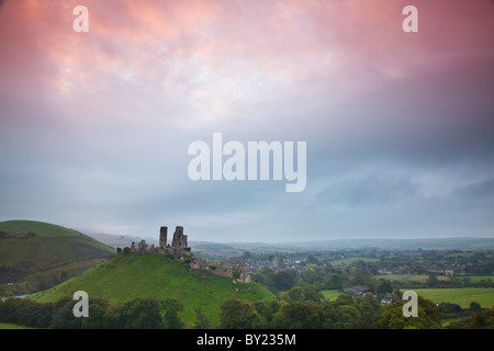 England, Dorset, Corfe Castle.  Sunrise at Corfe Castle, one of Britain's most majestic ruins and once a controlling gateway Stock Photo
