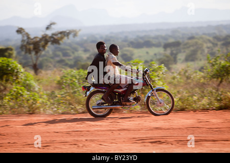 NAMPULA, MOZAMBIQUE, May 2010 : People on the road road out of town.    Photo by Mike Goldwater Stock Photo