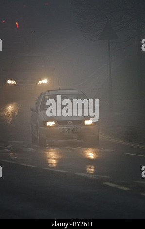Poor visibility driving conditions in heavy rain; drivers point of view ...