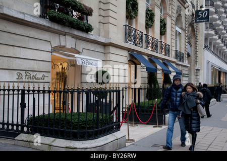 Famous Avenue Montaigne street sign in golden letters in Paris