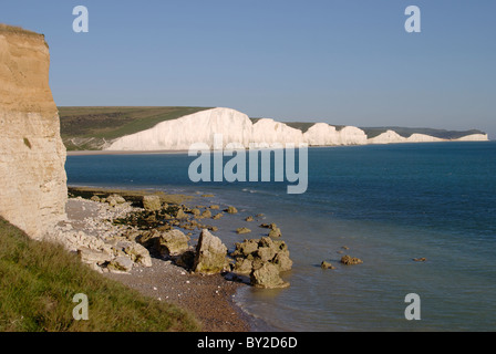 The Seven Sisters chalk cliffs between Seaford and Eastbourne in East Sussex. England. Viewed from Hope Bay. Stock Photo