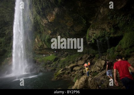 Tourists visit the Misol Ha waterfall in Salto de Agua, Chiapas, Mexico Stock Photo