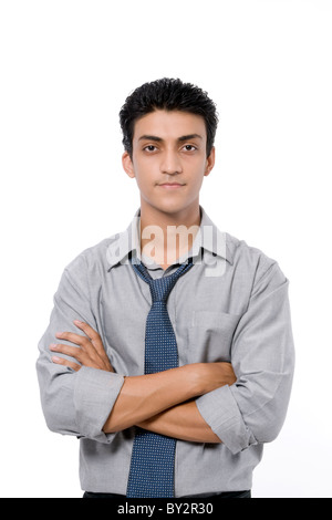 A confident man with arms folded. Stock Photo