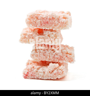 Coconut Ice confectionery isolated on white from low perspective. Stock Photo