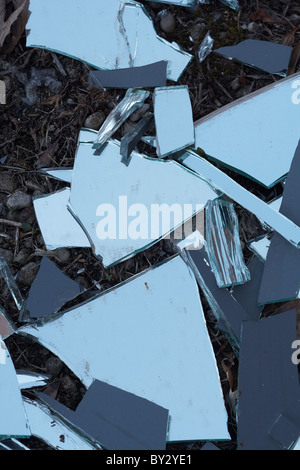 Broken mirror on the ground Stock Photo