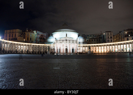 Night view church of San Francesco di Paola with colonnades extending to both sides of the Piazza del Plebiscito,.Naples, Italy Stock Photo