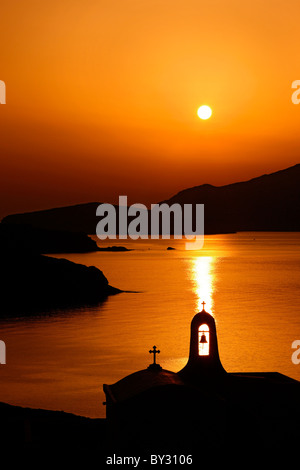 Sunset between Tinos and Andros islands, Cyclades, Greece Stock Photo