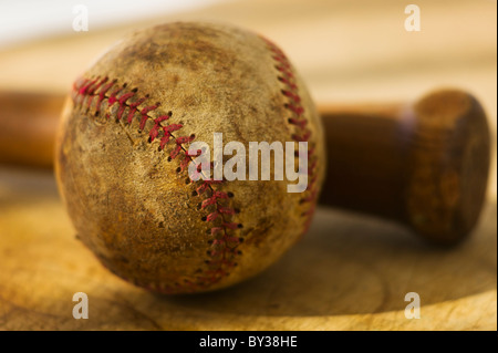Antique baseball with baseball bat Stock Photo