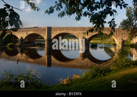 Stone arched bridge over River Wye at Builth Wells (Llanfair-ym-Muallt) Powys Mid Wales UK Stock Photo