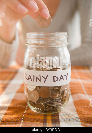 USA, New Jersey, Jersey City, Saving up for rainy day Stock Photo