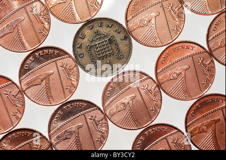 One penny is the odd-one-out Stock Photo