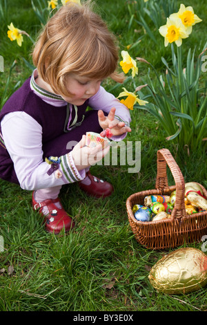 Girls on an Easter egg hunt in Lancashire, UK. Stock Photo