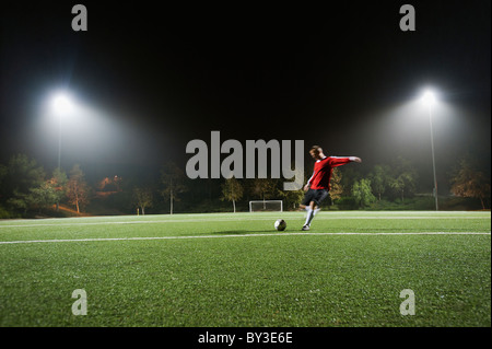 USA, California, Ladera Ranch, Football player preparing for penalty kick Stock Photo