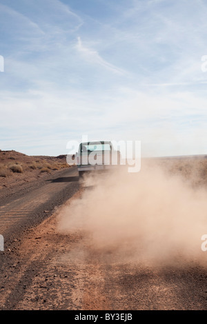 USA, Arizona, Winslow, Pick-up truck driving Stock Photo