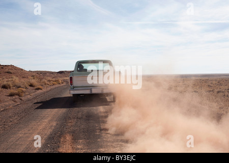 USA, Arizona, Winslow, Pick-up truck driving Stock Photo