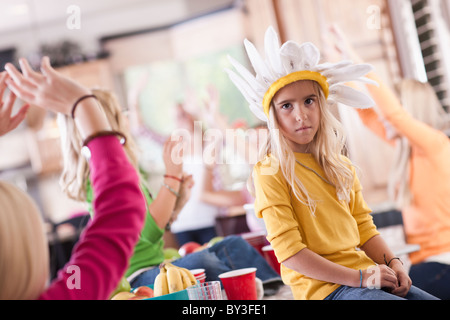 USA, Utah, family portrait of sisters (6-7, 8-9, 12-13, 14-15, 16-17) having fun at table Stock Photo